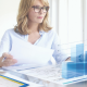 Woman reading Essential Reports